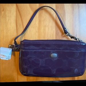Coach purple wristlet